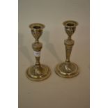 Pair of Victorian Sheffield silver candlesticks of baluster spiral fluted form, 7ins high