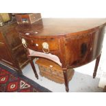 19th Century mahogany bow front sideboard having crossbanded top over a single central drawer with