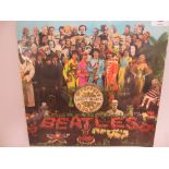 Beatles ' Sergeant Pepper's Lonely Hearts Club Band ' vinyl album