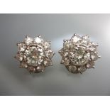 Pair of fine quality 18ct white gold eleven stone diamond cluster ear clips, makers mark, S.B. and