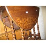 Early 20th Century oak gate leg table on barley twist supports