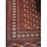 Pakistan Bokhara pattern rug on wine ground, 48ins x 84ins