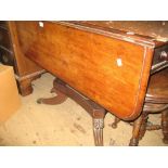 Late Regency rectangular mahogany drop-leaf breakfast table raised on square tapering column and