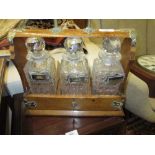 Late Victorian brass mounted three bottle tantalus