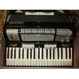 Piano accordion by I. Busilacchio, with later fitted Selmer pick-up in original fitted case