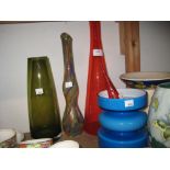 Orange glass shop display bottle and three various Art Glass vases