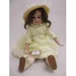 Armand Marseille bisque headed doll with articulated body, ' Flora Dora ' with kid leather and