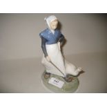 Royal Copenhagen figure of a young girl with goose, 7ins high