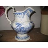 19th Century blue transfer printed pottery water jug
