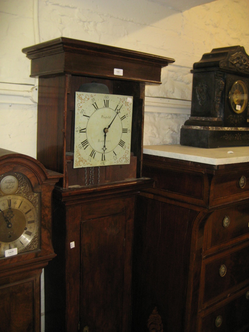 George III elm and pine longcase clock with square hood above a rectangular panelled door and