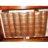 Group of seven leather bound volumes of Clark's Bible, printed for Thomas Tegg and Son, 1836