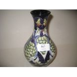 Moorcroft baluster form vase with tube line decoration of grapes and grape vine, dated 2003, 8ins