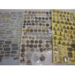 Three boards mounted with a quantity of military badges including: collars, cap badges (some