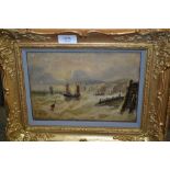 19th Century gilt framed oil, sailing vessels near the coast at sunset, monogrammed and dated 1879,