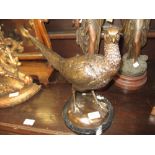 Reproduction bronze figure of a pheasant on a circular marble base