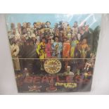 Group of six Beatles L.P's including ' Sergeant Pepper ' with cardboard cut-out, ' Magical Mystery