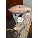 Circular white painted metal garden table