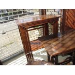 Nest of four Edwardian mahogany satinwood crossbanded and line inlaid occasional tables