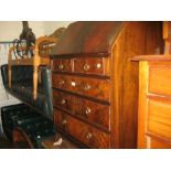 Reproduction mahogany bureau, the fall front above two short and three long graduated drawers with