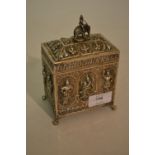 Burmese silver rectangular casket, the hinged cover mounted with a figure riding an elephant,