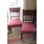 Pair of late Victorian walnut side chairs on ring turned tapering front supports