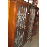 Early 20th Century mahogany two door display cabinet with leaded glass doors