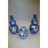 Pair of Chinese porcelain double gourd shaped prunus blossom vases,