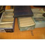Album containing a collection of miscellaneous postcards together with three boxes containing a