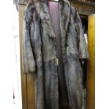 Ladies three quarter length dark brown fur coat and a similar jacket