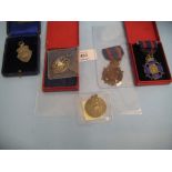 Group of four silver and enamel medals inscribed Miniature Rifle Clubs,