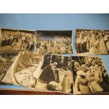 Group of eleven press photographs of Queen Elizabeth II Coronation including: processions, ceremony,