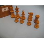 20th Century boxwood and ebonised weighted chess set in a pine box