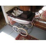 Dolls pram by Silver Cross,