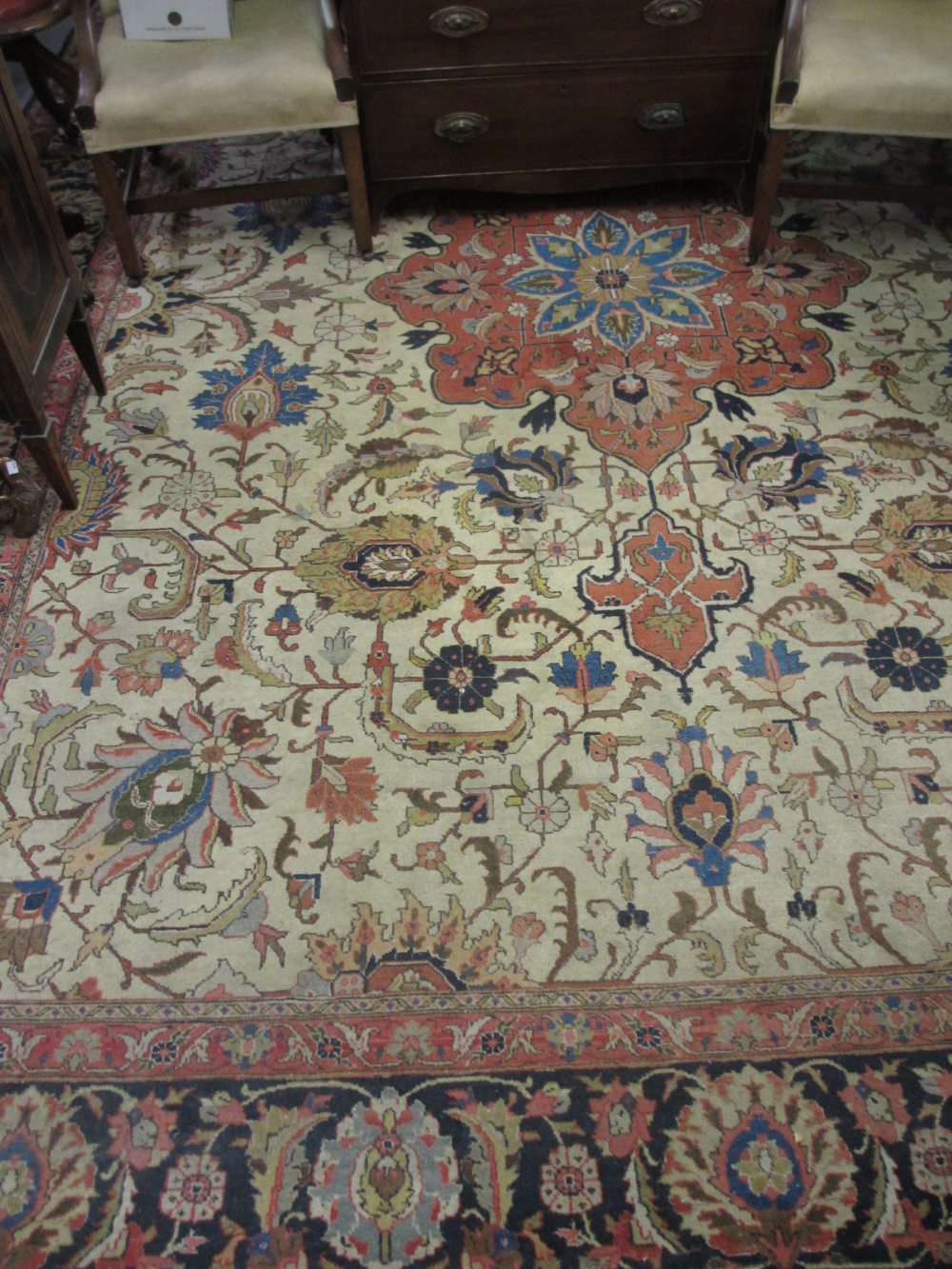 Sparta carpet with medallion and all-over palmette design on an ivory ground with borders,