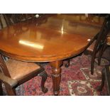 Mahogany and teak D-shaped pull-out extending dining table,