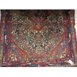 Small Hamadan rug with lobed medallion and all-over Herati design on an ivory ground with borders,