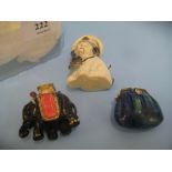 Three various tape measures in the form of a dog sailor,