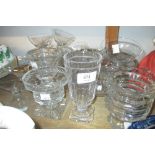 Four various 19th / 20th Century cut glass pedestal sweet meat dishes, a foliate etched comport,