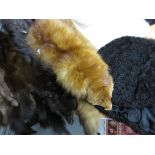 Collection of various fur hats and stoles