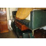 20th Century green button rexine upholstered three piece suite of rectangular form raised on square