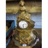 19th Century French gilt metal mantel clock having circular enamel dial with Roman numerals and