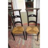 Pair of Edwardian marquetry inlaid side chairs,