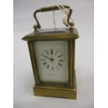 Miniature gilt brass cased carriage clock, the enamel dial with Roman numerals, signed Hopwood,