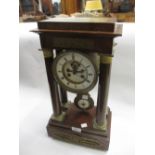 19th Century mahogany portico clock having circular enamel dial with Roman numerals and visible