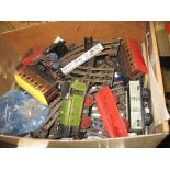 An '0' gauge three rail electric train set including 0-4-0 locomotive,