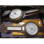 Two oak cased wall barometers and two modern barometers