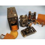 Midget box camera together with a Kodak bellows camera,