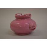 Chinese carved pink hardstone two handled squat baluster vase,