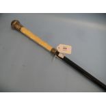 Edwardian ebony and silver mounted walking cane with carved ivory grip