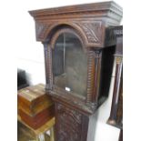 George III carved oak longcase clock case,